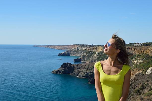 istock Beautiful girl on a sea bay 494680249