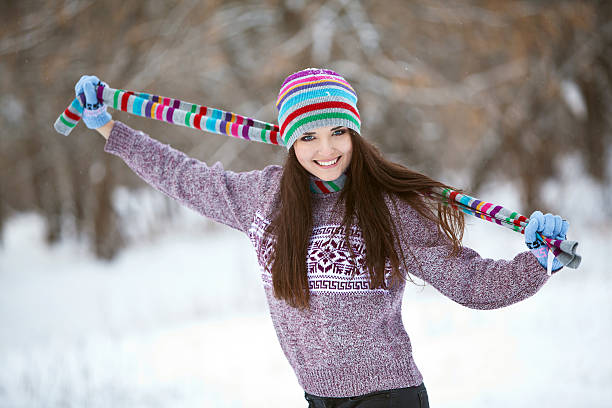 Girl in winter forest fun stock photo
