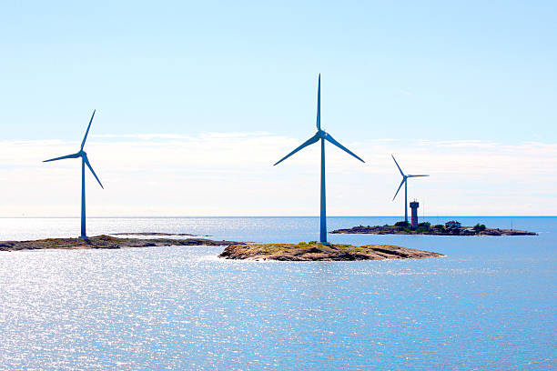 offshore electricity wind generators Elecricity wind generators at Baltic Sea in Aland region. åland islands stock pictures, royalty-free photos & images