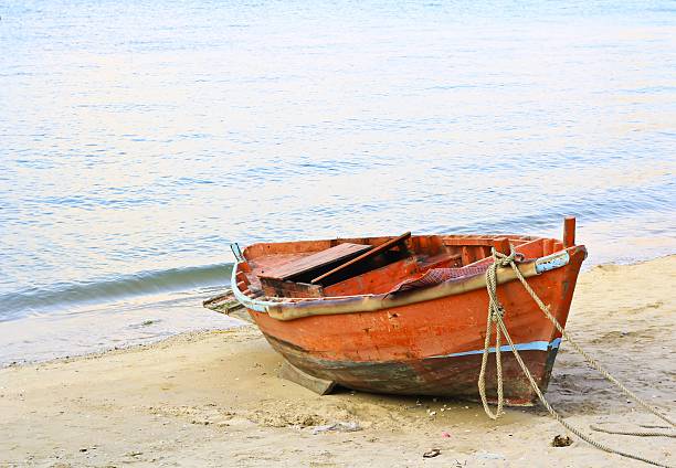 istock Boat on the beach at sunrise time 494680709
