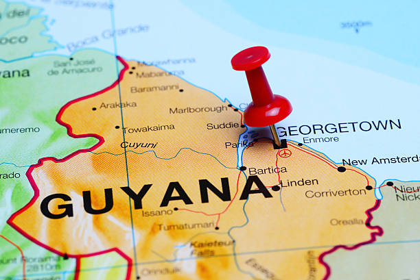 Georgetown pinned on a map of America Photo of pinned Georgetown on a map of South America. May be used as illustration for traveling theme. guyana photos stock pictures, royalty-free photos & images
