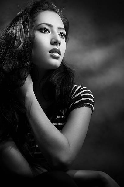 istock Beautiful Asian young woman looking away with blank expression. 494702066
