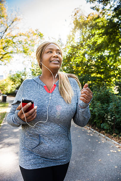 istock Woman running in Central Park New York 494703182
