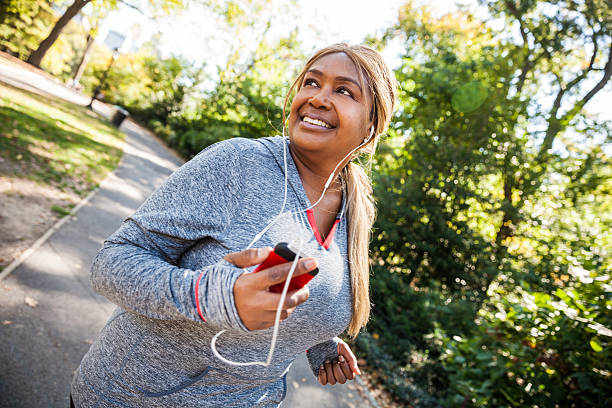 istock Woman running in Central Park New York 494703590