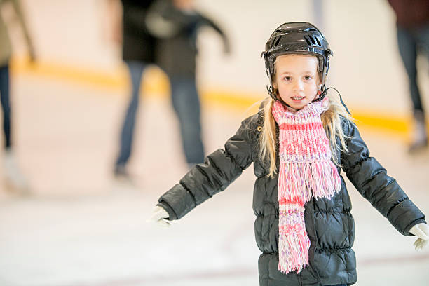 istock Little Girl Learning to Ice Skate 494704240
