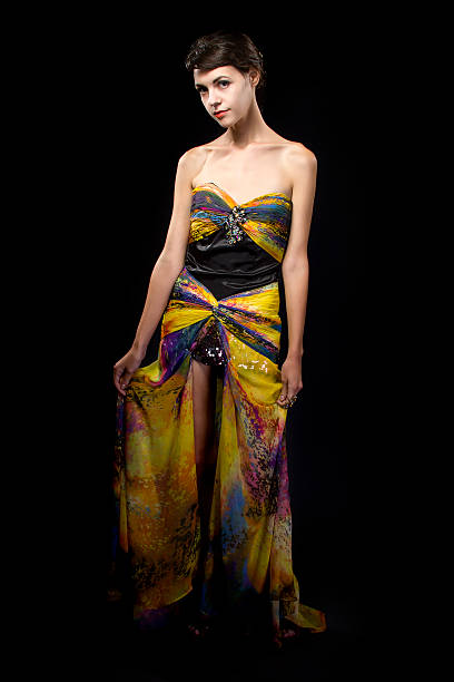 istock Bright Yellow Dress on a Dark Background 494704532