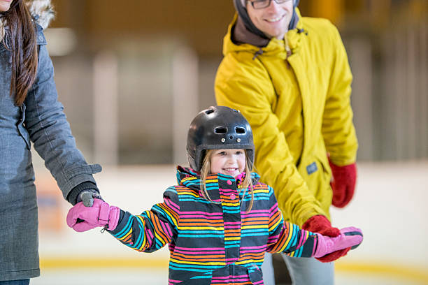 istock Little Girl Skating with Her Parents 494706754