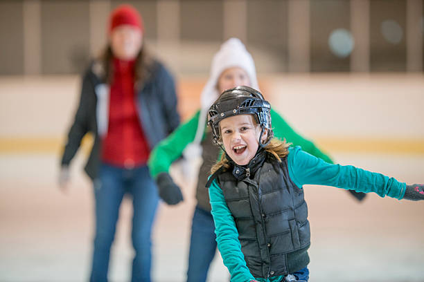 istock Sisters Ice Skating Together at the Rink 494707548
