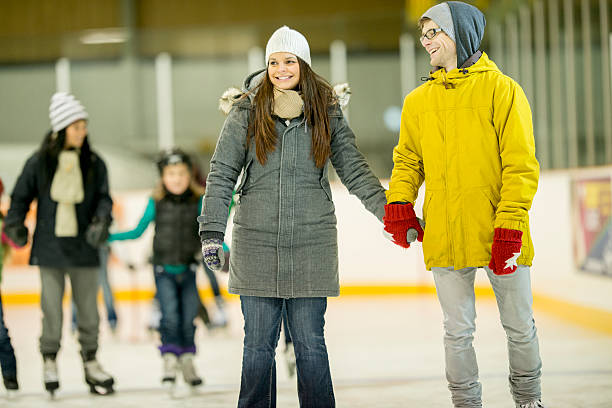 istock Couple Ice Skating Together at the Rink 494709144