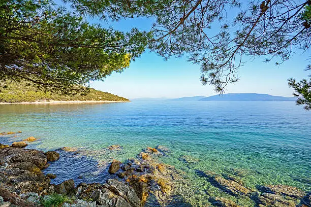 Cres Island, Croatia: View from the beach promenade to the sea near village Valun