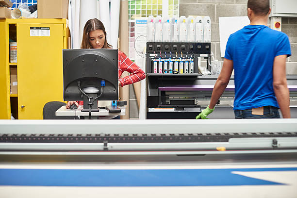 istock young woman working at a digital printing company 494711028