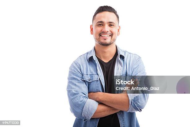 Latin Young Man In A Studio Stock Photo - Download Image Now - Men, White Background, People
