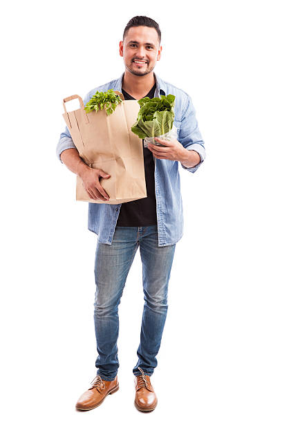 istock Healthy man buying vegetables 494711890