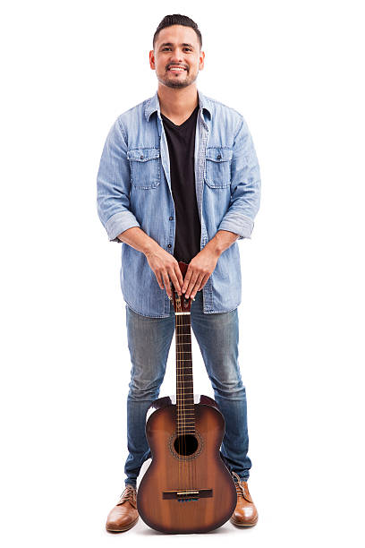 latina músico con su guitarra - isolated on white studio shot guitar young men fotografías e imágenes de stock