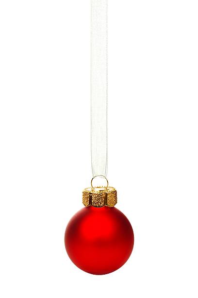istock Red Christmas ornament on silver ribbon over white 494711956