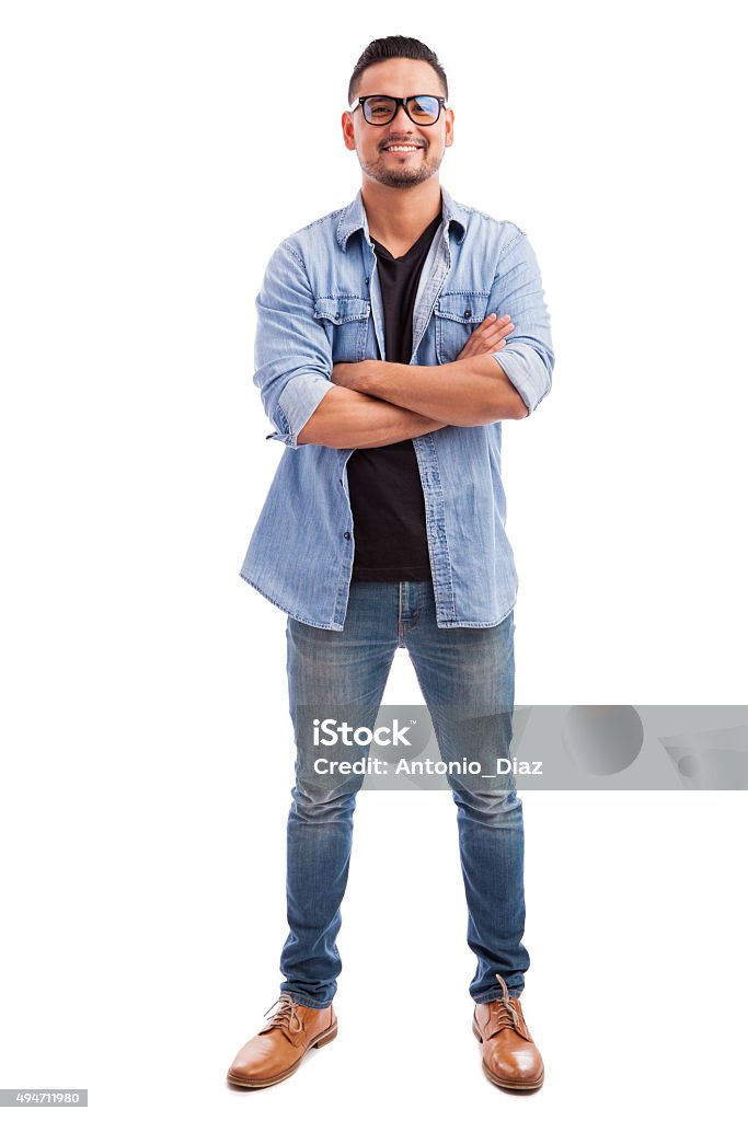 Happy hipster in white background Full length view of a young man wearing glasses and dressed casually against a white background Men Stock Photo