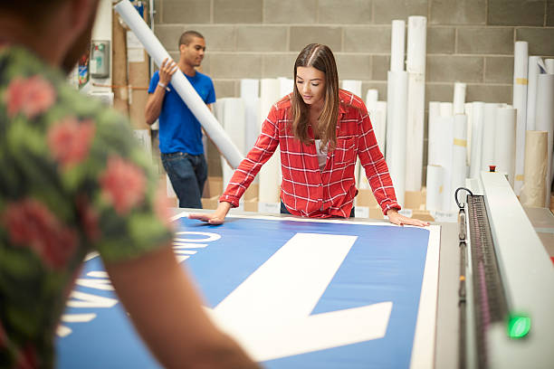 istock young woman working at a digital printing company 494712646