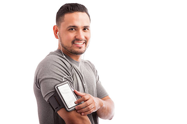 istock Latin athlete finding his favorite playlist 494713584