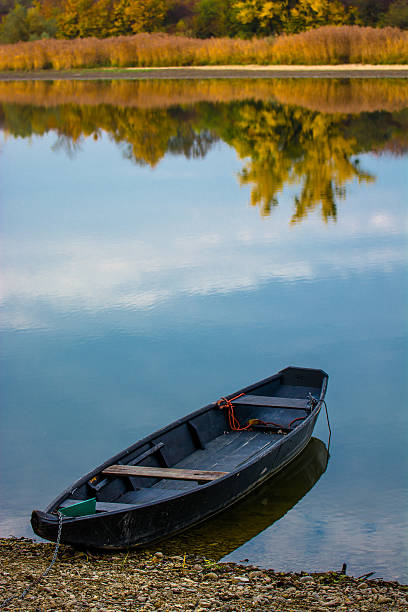 istock Boat On Calm Sea In Autumn 494713856