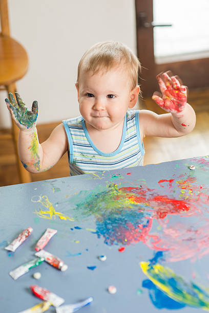 istock Painting baby hand 494713876