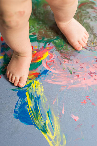istock Painted feet from young child 494725272