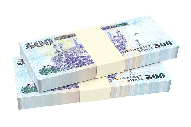 istock Saudi Arabia rials bills isolated on white background. 494725852