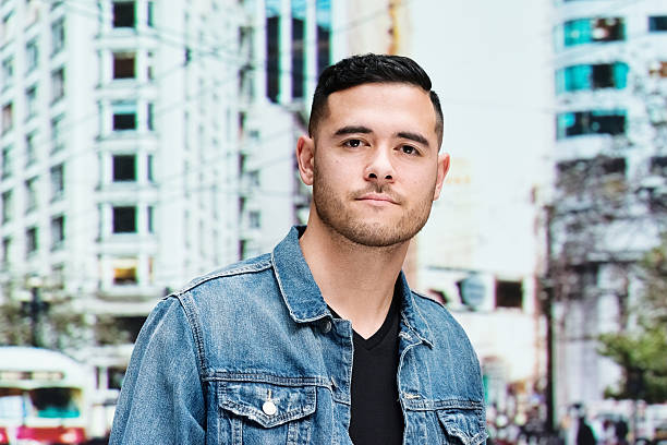 istock Casual man outdoors and looking at camera 494726064