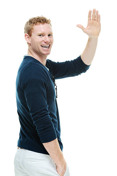 istock Cheerful casual man waving hand 494727492