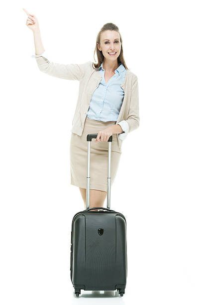 istock Smiling businesswoman pointing up 494729160