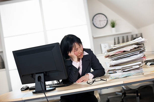 istock Asian Business Woman Overwhelmed 494730082