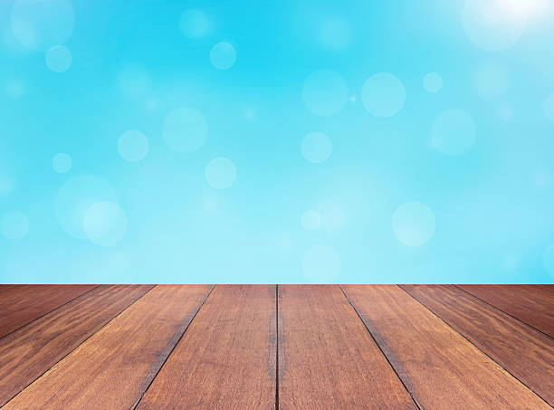 istock Bright winter season background and perspective wooden plank 494733656
