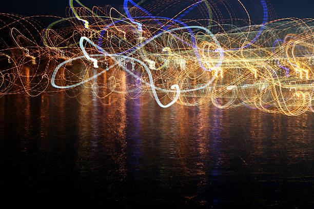 istock abstract colored waves of illumination in the reflection over th 494733966
