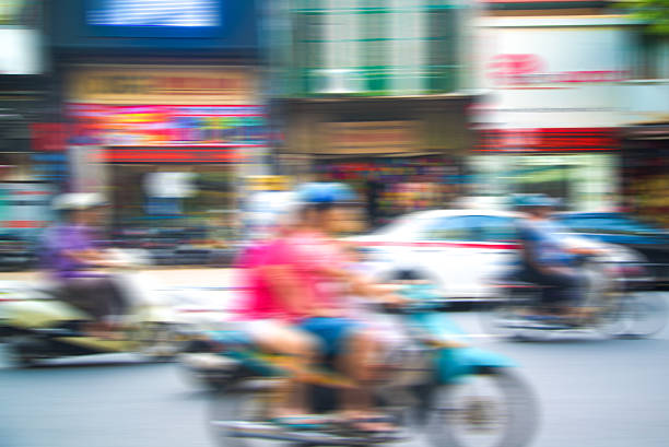 istock Blurred rider in vietnam (motion in vietname) 494735842