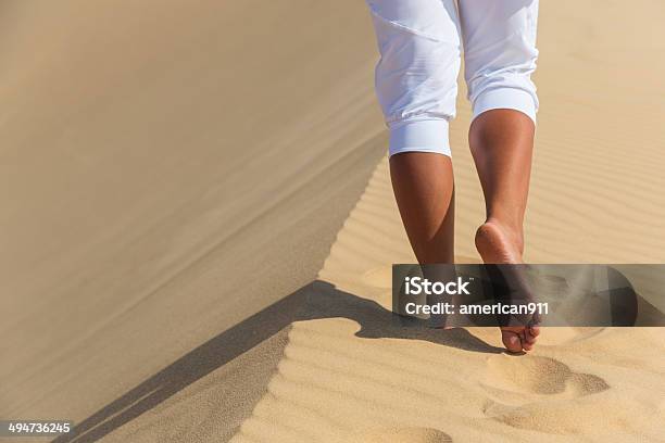 Womens Beautiful Smooth Legs On White Sand Beach Stock Photo - Download Image Now - Adult, At The Edge Of, Barefoot