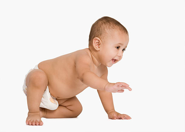 istock Baby boy crawling and smiling 494736476