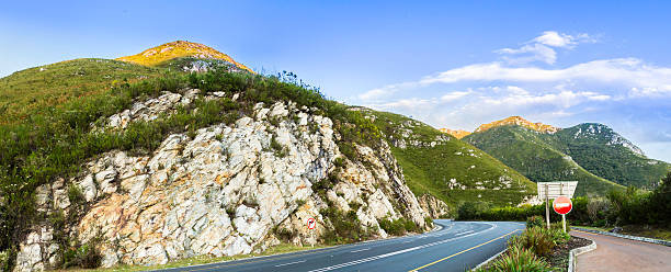 Outeniqua mountain pass with its rock formation Outeniqua mountain pass with its dolomite rock formations seen cut accross, from the road built through these mountains. george south africa stock pictures, royalty-free photos & images