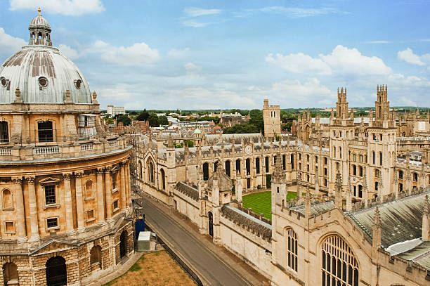 University buildings in a city University buildings in a city, Radcliffe Camera, Oxford University, Oxford, Oxfordshire, England oxford university photos stock pictures, royalty-free photos & images
