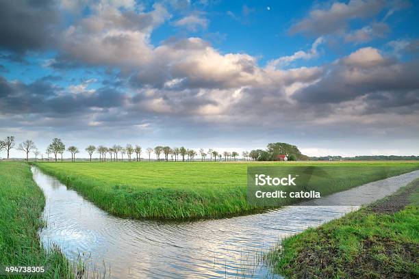 Beautiful Dutch Farmland With Blue Sky Stock Photo - Download Image Now - Blue, Canal, Curve