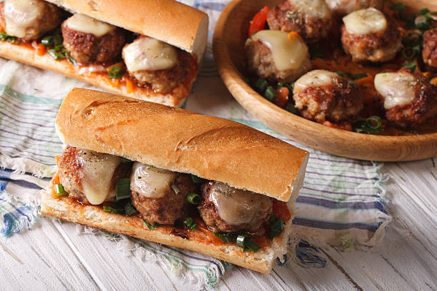 istock sandwiches with meatballs, cheese horizontal top view 494738556