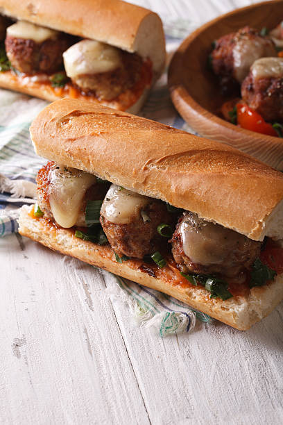 istock Sandwiches with meat balls, cheese and herbs vertical 494738844