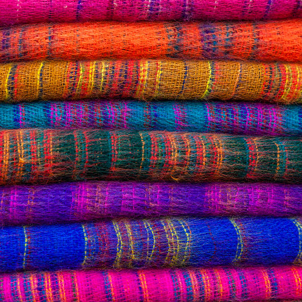 Colourful pashmina shawls for sale on nepali street market, Asia.