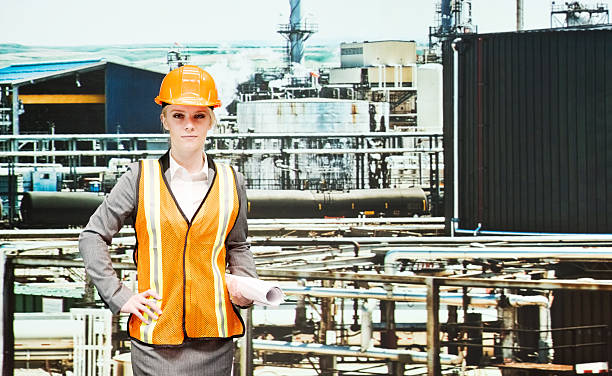 istock Female architect in oil refinery 494739710