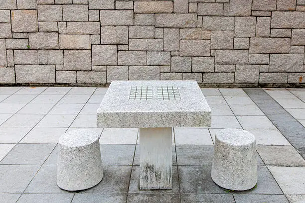 Chinese stone chessboard with chair
