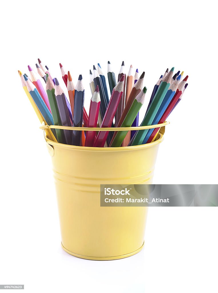 The set of varicoloured pencils in  pail The set of varicoloured pencils in the yellow pail Art Stock Photo