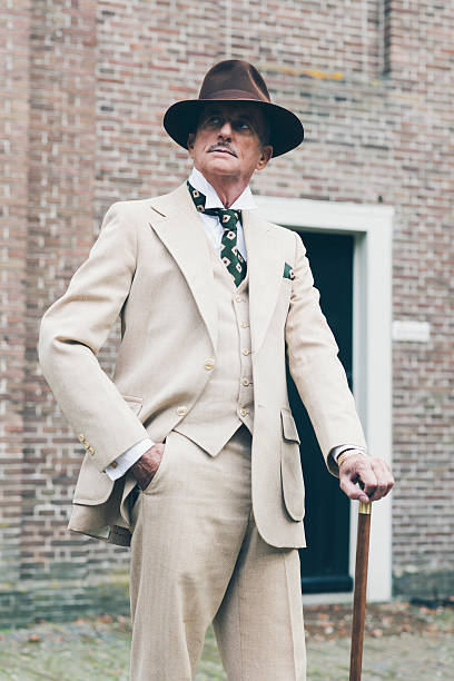 istock Well dressed senior man standing with cane. 494757214