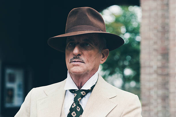 istock Close-up of senior dandy with hat and suit. 494757232