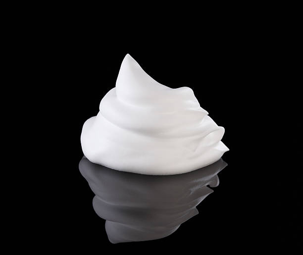 Shaving cream on black shaving foam isolated on black background shaving cream stock pictures, royalty-free photos & images