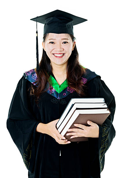 istock Female graduate holding books 494758688