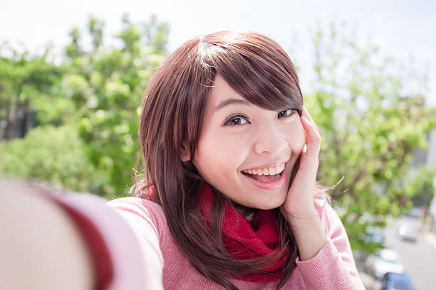 istock Young woman take a selfie 494760530