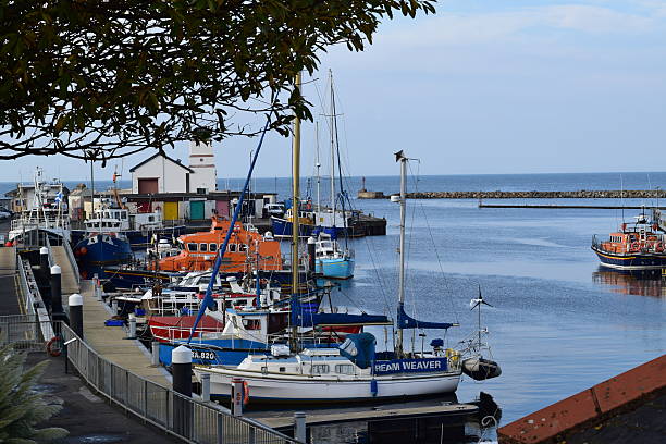 istock Boats in a Scottish harbour 494760712